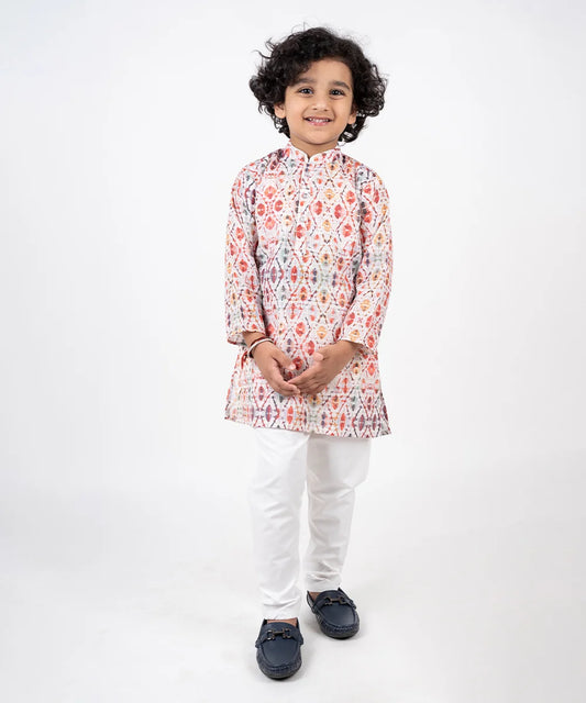 It is a beautiful Patola printed cotton kurta with Nehru collar teamed up with off White Pajama for boys.