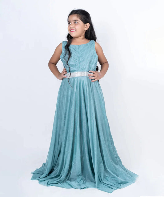  It’s a sea-green Colored gown that comes with the back zip closure. It features pleated detailing on yoke and a belt style lace on waist. Moreover, it also has fabric belt to be tied at the back.