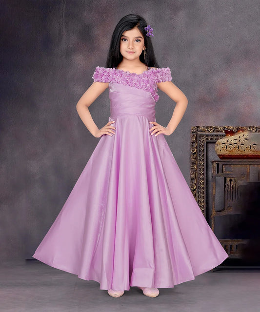  It’s a beautiful purple coloured party-wear baby girl gown with a back zip closure paired up with a matching inner. It features floral work with classic pleated detailing on the yoke and a fabric belt to be tied at the back. 