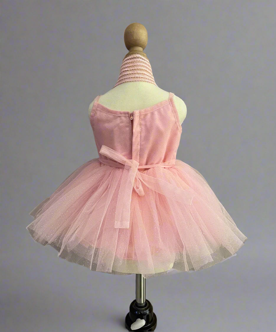 back view of peach frock for baby girls