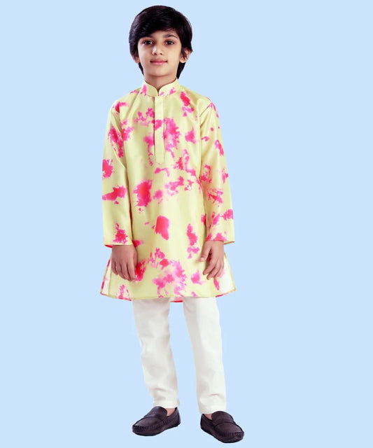 It is a smart tie-and-dye kurta pyjama set in yellow, pink and white colour that creates a spotlight of its own.