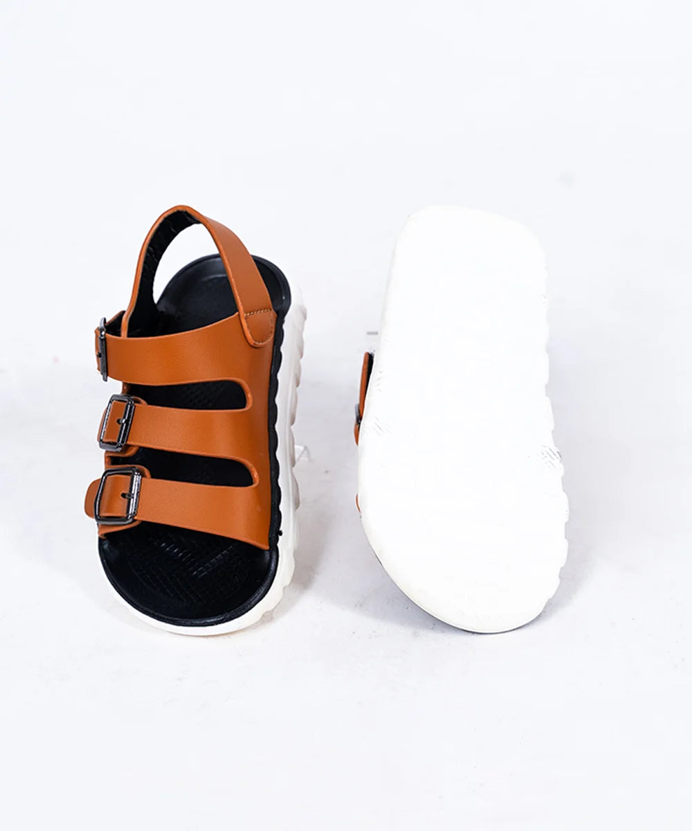 Close-up of trendy tan open-toe sandals for boys with metal buckles, Jaipur