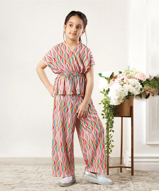 This Outfit consists of a multicolour elasticated top and a wide-leg pants. The top comes with a matching designer belt.
