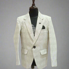 It is elegant light colored check textured blazer that comes with a cool black round neck half sleeve t-shirt. This silhouette features one-button fastening, a cute broach on the peak lapel collar and a pocket square. 