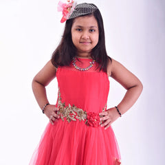  It is a red Colored double-layer party gown that comes with short sleeves that can be stitched as per requirement. It features floral embroidery detailing on the dress that uplifts the entire look.