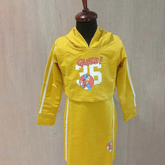  It consists of a straight-fit mustard Colored party dress paired up with a crop top that comes with a hoodie. It features a beautiful Donald duck print on the dress. It’s a 3 in 1 dress as a crop top and straight fit dress both can be styled individually as well.