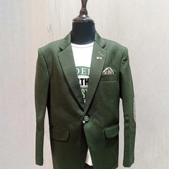 Green Colored blazer that comes with a smart white round neck and half sleeved t-shirt. It features a nice broach, a pocket square and patched elbow detailing.