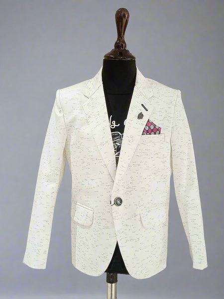 It is a smart cream color textured blazer for your kid boy that comes with a cool black round neck and half sleeved t-shirt. It features a stylized broach on a classic notch lapel collar.