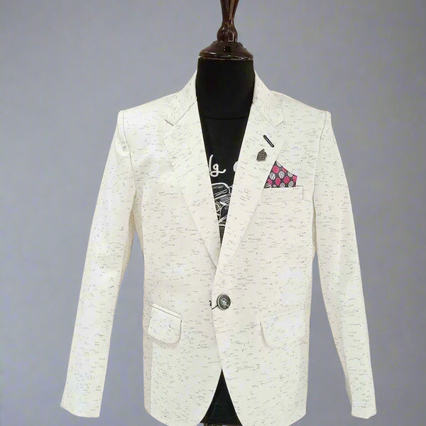 It is a smart cream color textured blazer for your kid boy that comes with a cool black round neck and half sleeved t-shirt. It features a stylized broach on a classic notch lapel collar.
