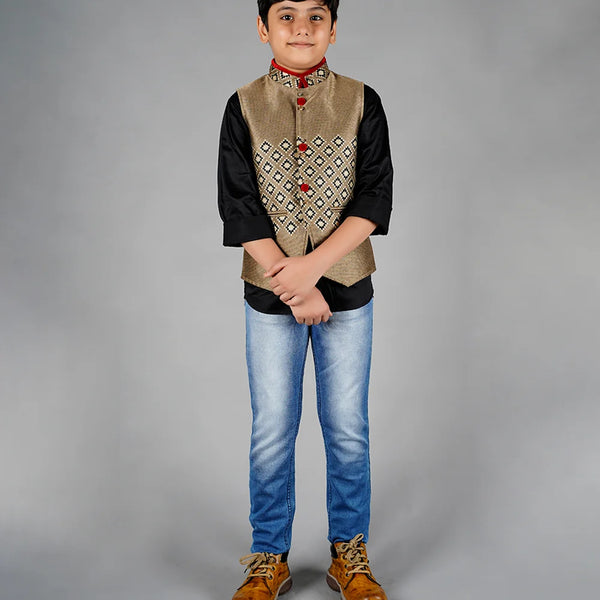 It is a beautiful beige color party wear waist coat set for boys. The entire set consists of a cut sleeved waistcoat jacket with a black Color Shirt. It does not have a pant.