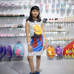 It is a black and white polka-dotted baby girl birthday dress online. It features a digital print on the dress and bead detailing on the collar.