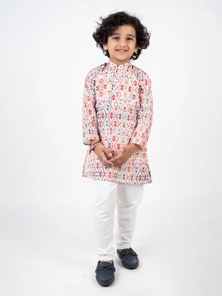 It is a beautiful Patola printed cotton kurta with Nehru collar teamed up with off White Pajama for boys.