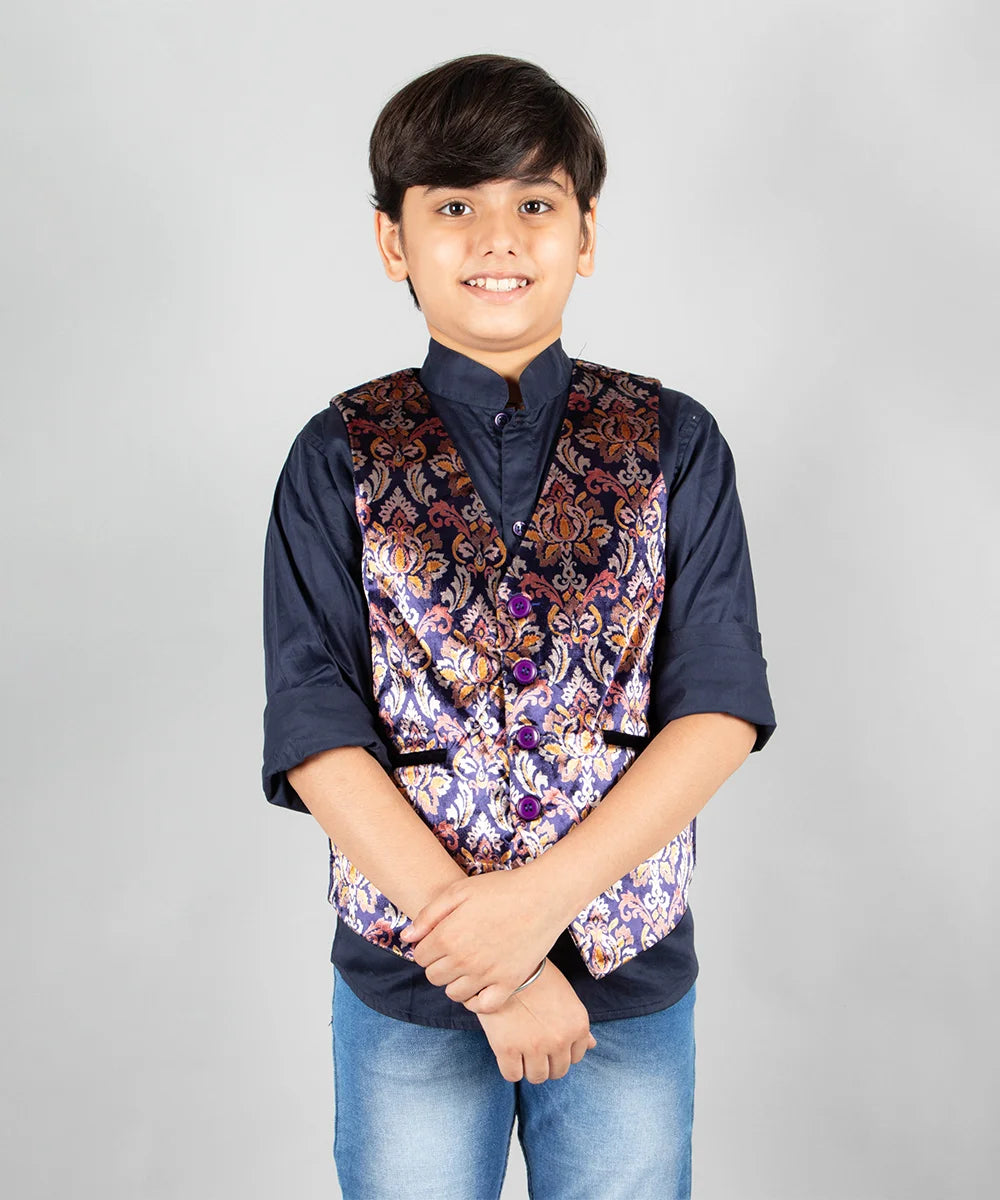 It is a beautiful Velvet Printed Jacket Set for a Party. The entire set consists of a printed waistcoat jacket and a black shirt. It does not have a pant. 