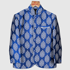 This classic blue colored Jodhpuri suit is curated from high quality brocade fabric. It comes along with pajama for boys.