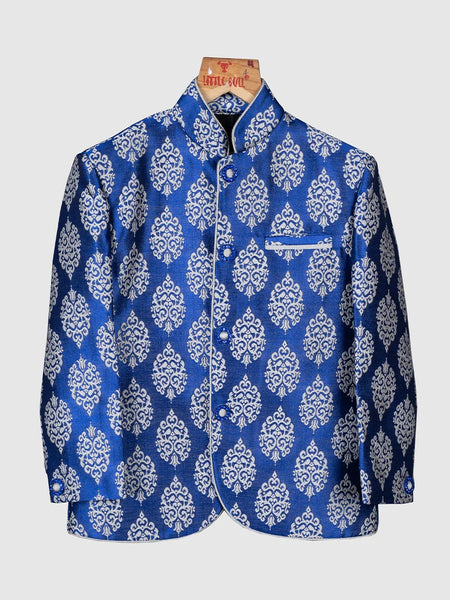 This classic blue colored Jodhpuri suit is curated from high quality brocade fabric. It comes along with pajama for boys.