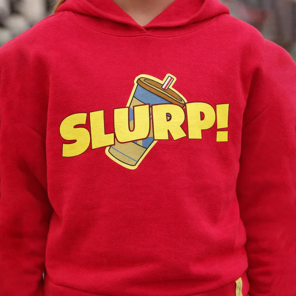 Red hoodie with 'SLURP!' design on a blurred background