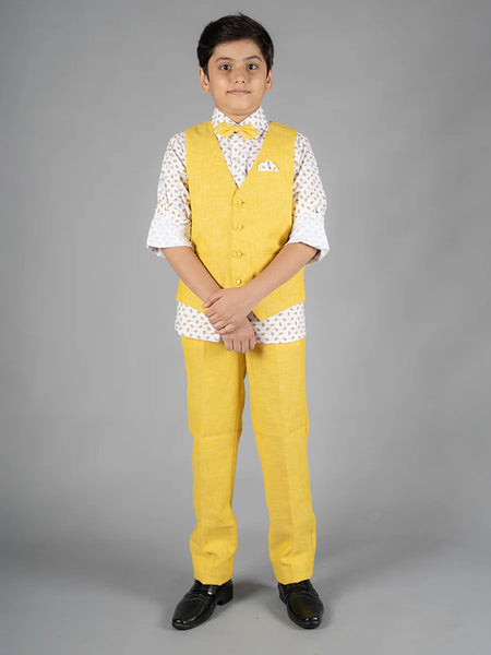 It’s a beautiful yellow Colored waist coat teamed up with a matching pant and a nice printed white Colored shirt. It features a cute bow and a printed pocket square to uplift the entire look.
