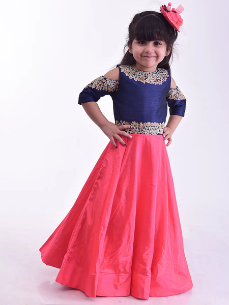 It’s a pink and blue party gown that comes with the back zip closure. It features floral embroidery detailing on the dress and comes with fabric belt to be tied at the back.
