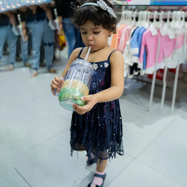  It is a navy blue Colored sequin party-wear fringe dress that comes with a back zip closure. It features floral and fringe detailing on the dress.