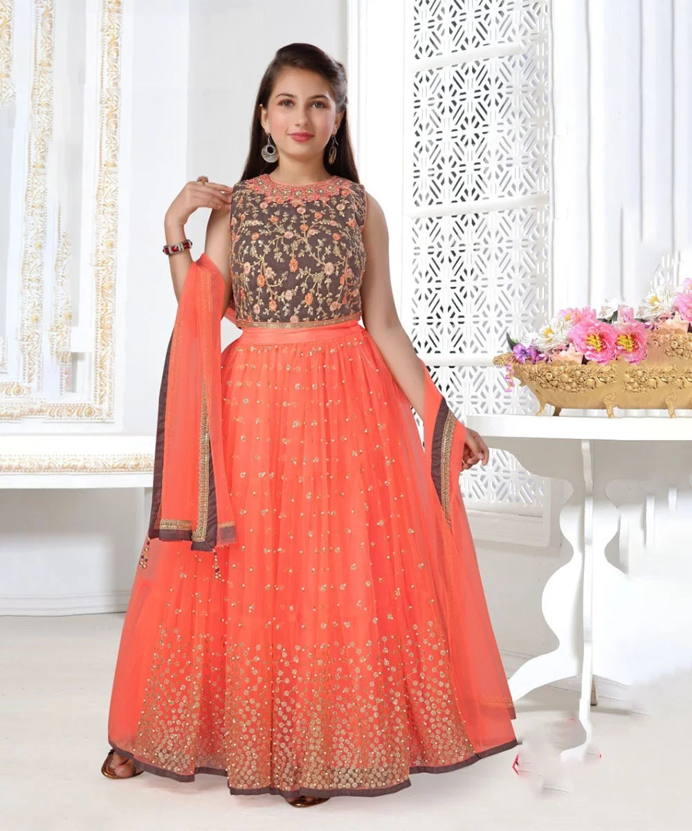 It consists of a crop top that comes with a back hook closure, a lehenga and a dupatta. It features an embellished neck, sequin and pearl work on lehenga and lace-on dupatta. Moreover, it comes with extra sleeves that can be stitched as per requirement.