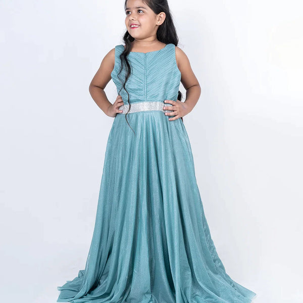  It’s a sea-green Colored gown that comes with the back zip closure. It features pleated detailing on yoke and a belt style lace on waist. Moreover, it also has fabric belt to be tied at the back.