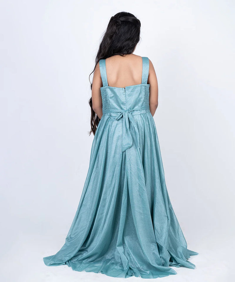 back view of sea green full length gown for girls 