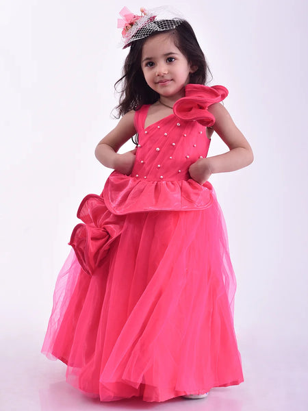 It’s a pink party gown for kids that comes with the back zip closure. It features flounce and pearl work detailing. Moreover, it also has a fabric belt to be tied at the back.