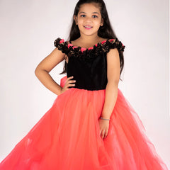 It’s a peach and black Colored gown for girl that comes with the back zip closure. It features floral as well as ruffle detailing on the dress and comes with the fabric belt to be tied at the back.