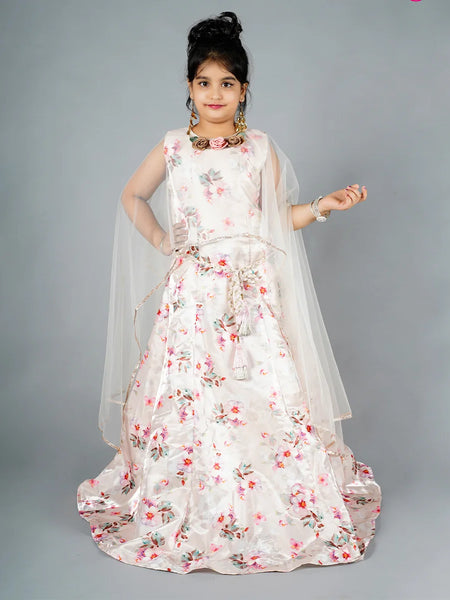 This cream Colored dress consists of a long floral printed gown and a white coloured cape curated from the soft fabric. It features a matching belt and floral detailing on the cape. Moreover, it comes with matching sleeves that can be stitched as per the requirement.
