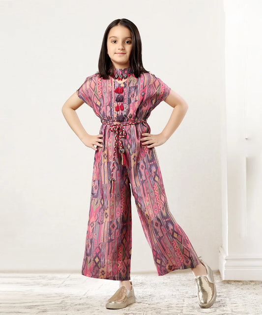  It is a multi Colored party wear dress that consists of a printed jumpsuit with a matching tie-string belt. This dress has a cut dana, Kodi, beads and tassel detailing on it making it the perfect outfit for festive events.