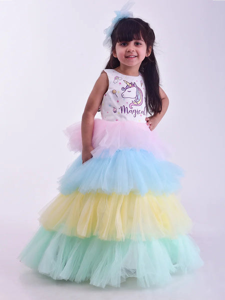 It’s a beautiful ruffle layered gown that comes with the back zip closure. Moreover, it is paired up with short sleeves that can be stitched as per requirement. It features digital print of unicorn and the fabric belt to be tied at the back.