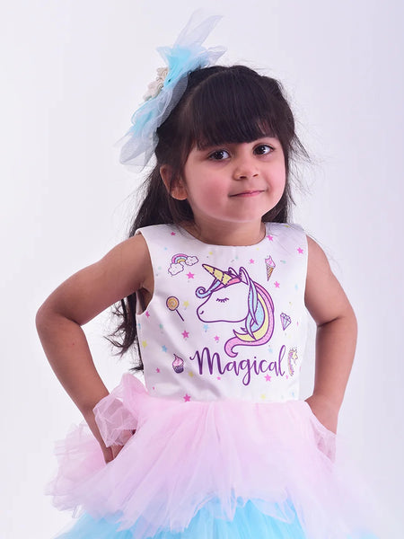 closeup view of unicorn pastel theme gown for baby girl