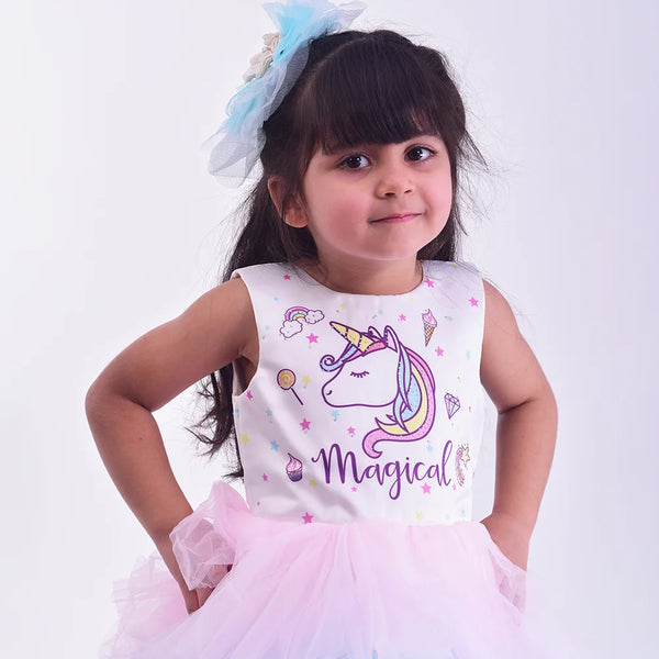 closeup view of unicorn pastel theme gown for baby girl