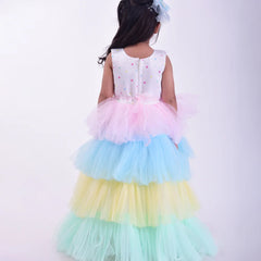 back view of pastel unicorn theme gown for baby girls