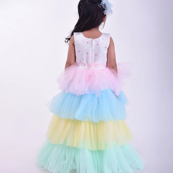 back view of pastel unicorn theme gown for baby girls