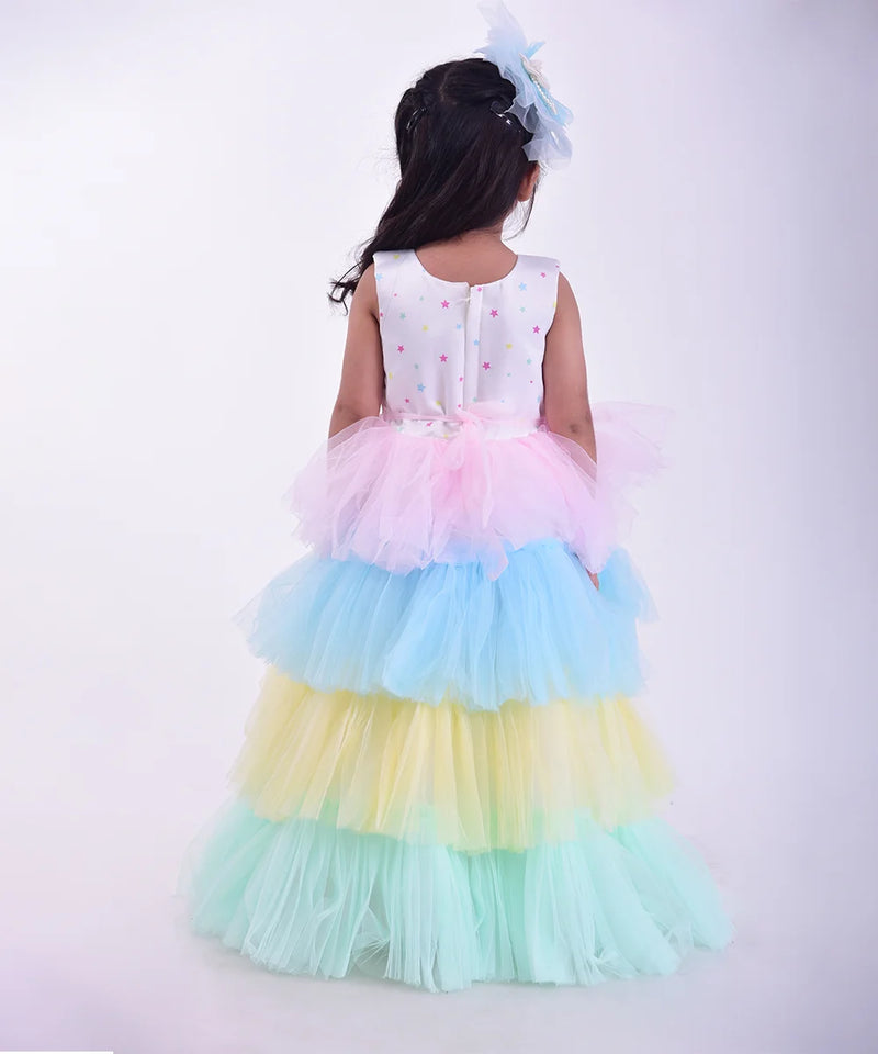 back view of pastel unicorn theme gown for baby girls