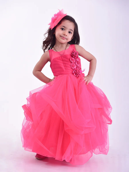 It’s a pink party gown for kid girl that comes with the back zip closure. It features floral as well as feather work on the dress and comes with the fabric belt to be tied at the back.