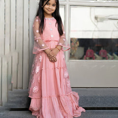 pink wedding wear gown paired with a shrug for girls 