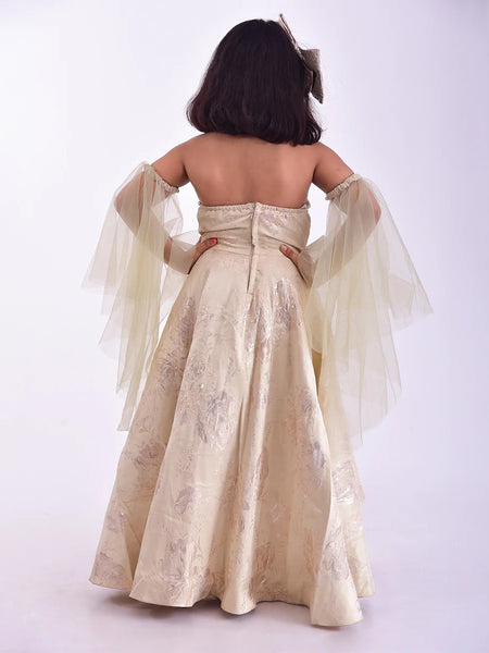back view of cream gown for girls 