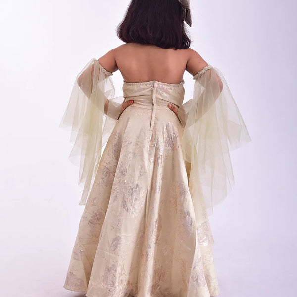 back view of cream gown for girls 