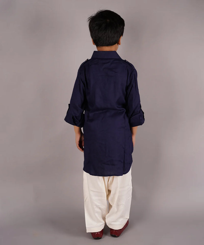 back view of solid navy kurta salvar set for boys