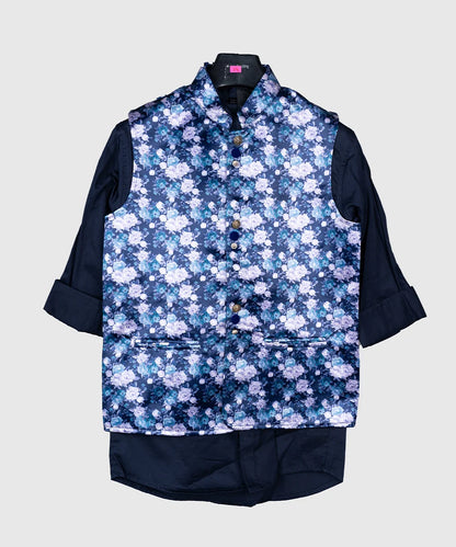 It is a beautiful navy blue Colored floral printed party wear waistcoat set for boys. The entire set consists of a printed waistcoat jacket with stylized buttons and a Navy Color Shirt.