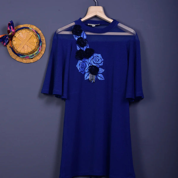 It is a royal blue Colored floral printed dress for girls. This dress has beautiful 3D and 2D floral detailing that uplifts the entire look.