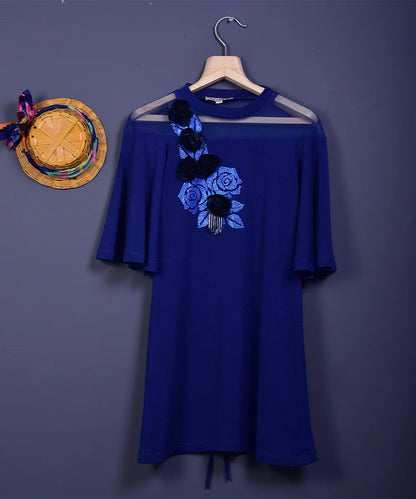 It is a royal blue Colored floral printed dress for girls. This dress has beautiful 3D and 2D floral detailing that uplifts the entire look.
