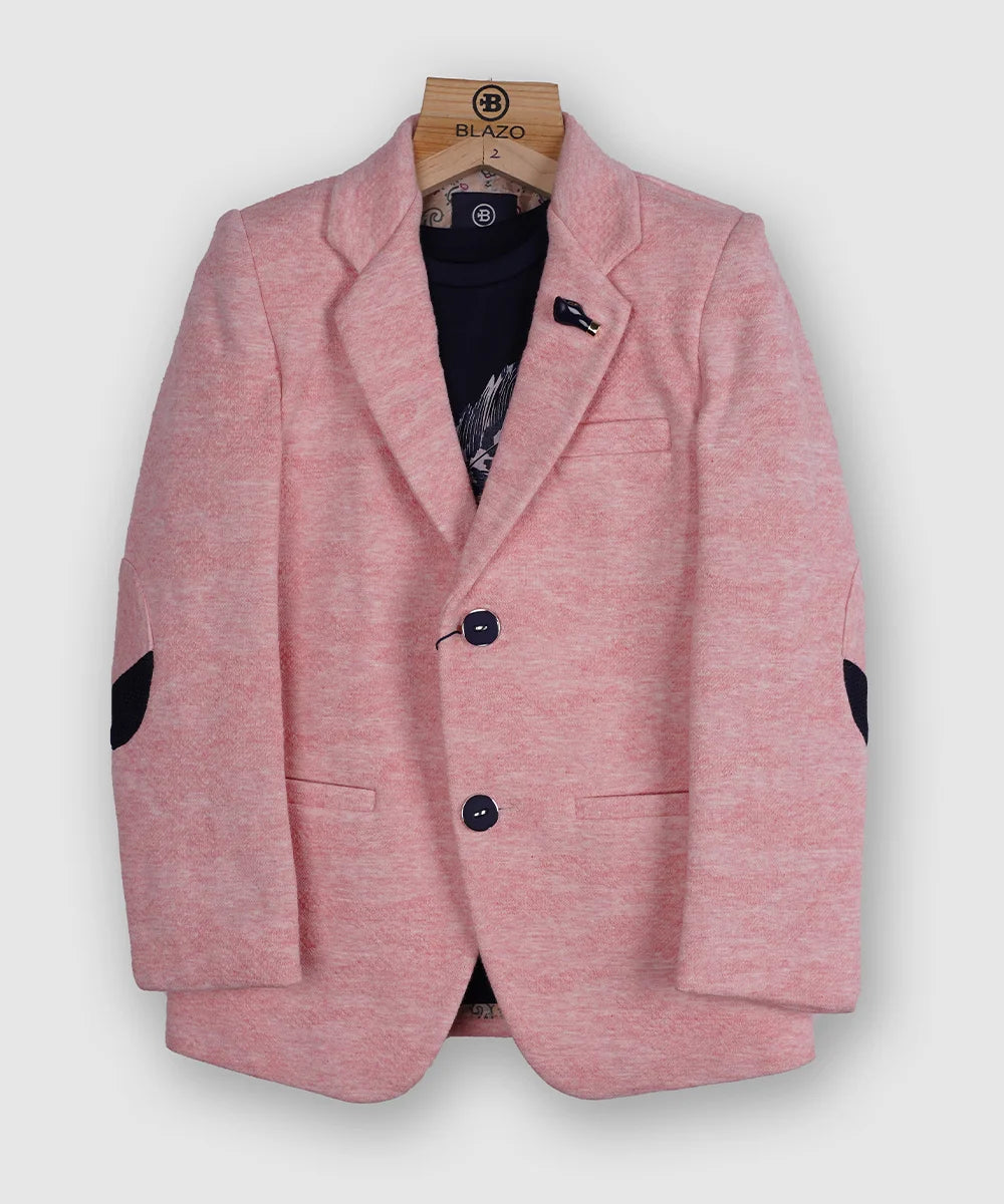 It is a beautiful light pink color, textured blazer that features a cute broach and a patch elbow detailing on the sleeves. It comes with a matching half sleeves round neck blue Colored t-shirt.