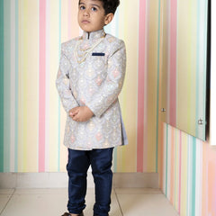 wedding embroidered sherwani paired with chudiars for boys