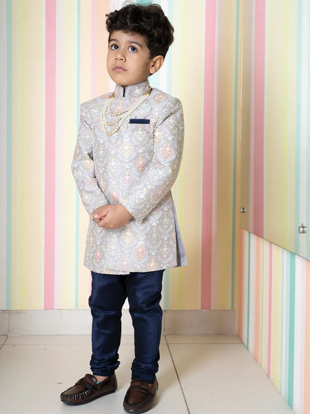 wedding embroidered sherwani paired with chudiars for boys