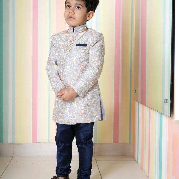 wedding embroidered sherwani paired with chudiars for boys