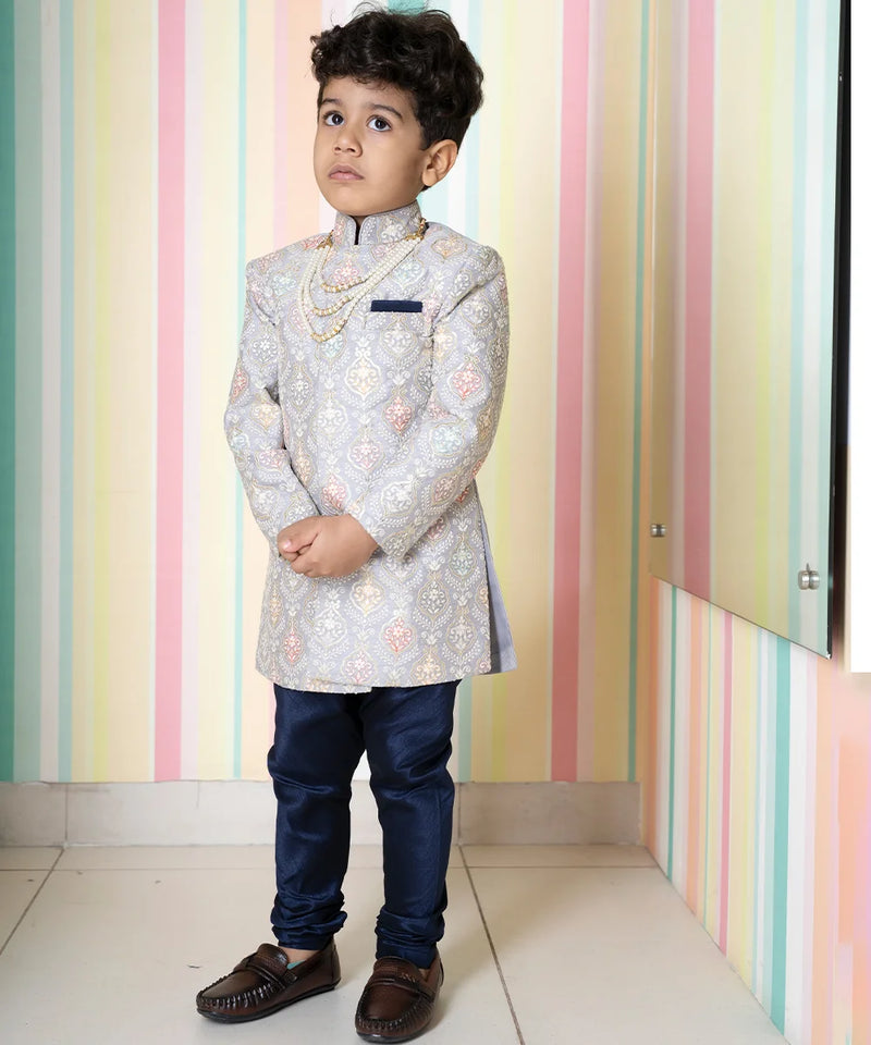 wedding embroidered sherwani paired with chudiars for boys