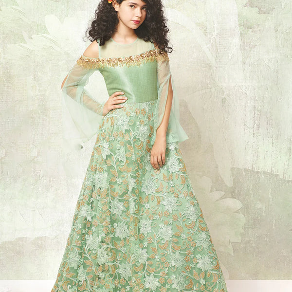 It’s a Pista green Colored party gown that comes with a back zip closure. It features sequin and cut Dana work detailing. Moreover, it also has a fabric belt to be tied at the back.